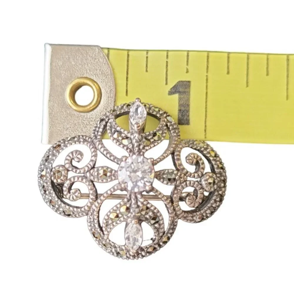Brooche/Pin-silver colored with Marcasite-Approx 1” in size.